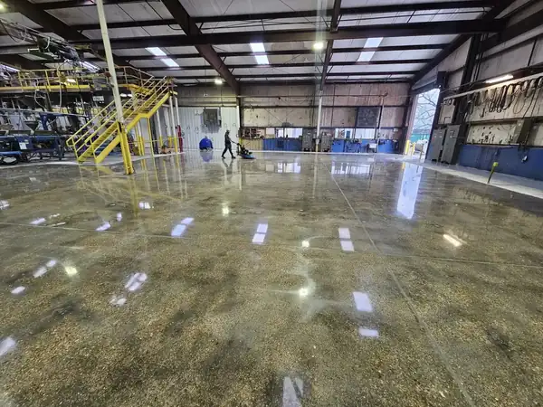 High-gloss floor across a production hall