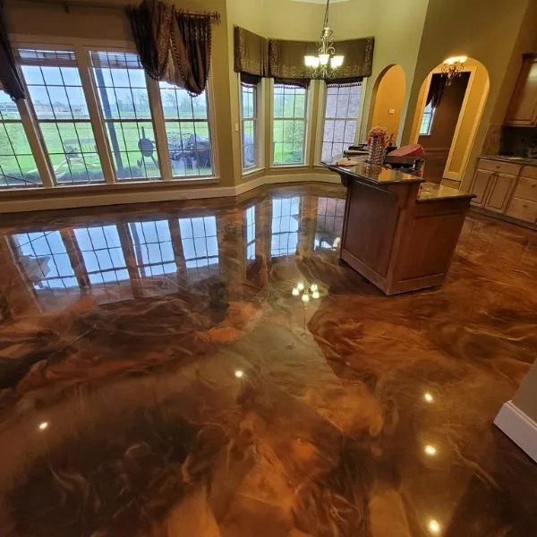 Copper metallic epoxy floor in a room with bay windows, Millcreek, Utah