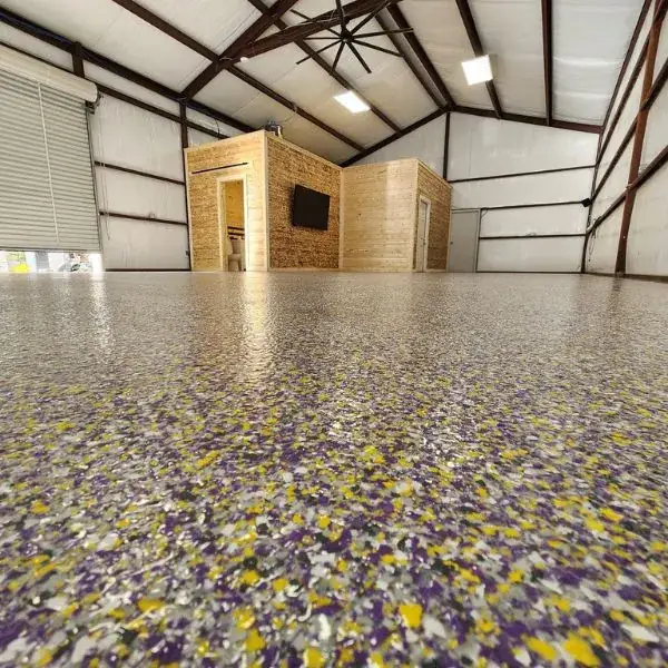 Multicolor flake epoxy floor in a steel shop building, Holladay, Utah