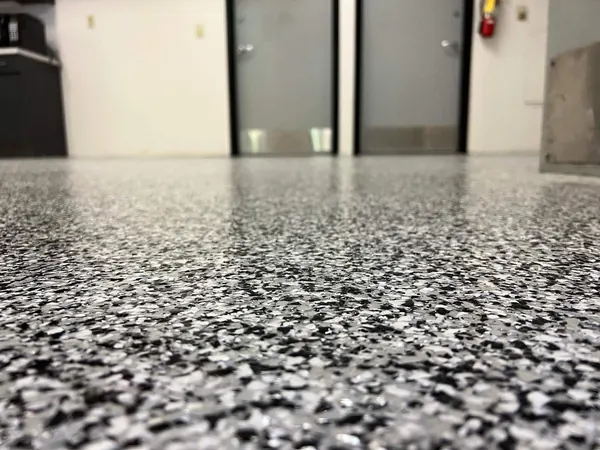 Black, white and gray flake epoxy floor in a commercial corridor, West Valley City, Utah