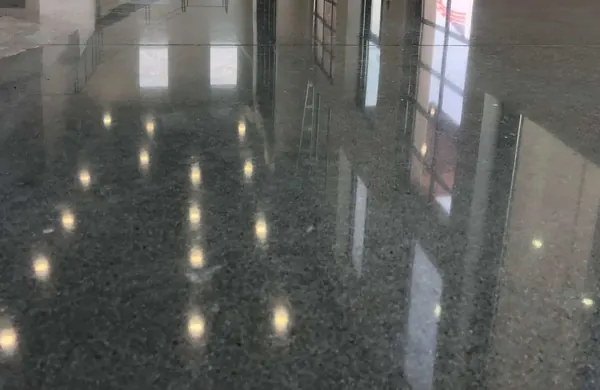 Dark high-gloss polished concrete floor in a showroom, Murray, Utah