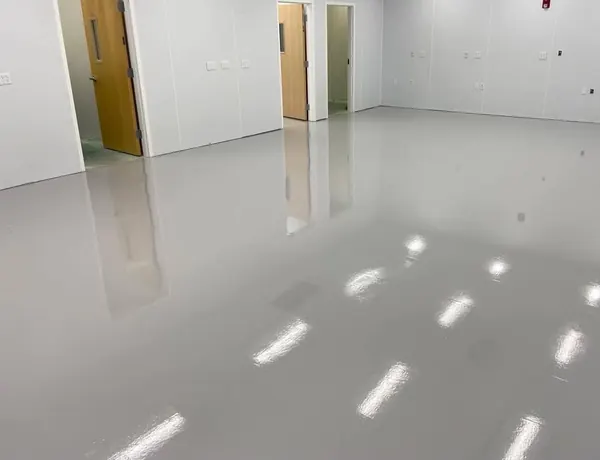Light gray high-gloss epoxy floor in a commercial room, Murray, Utah