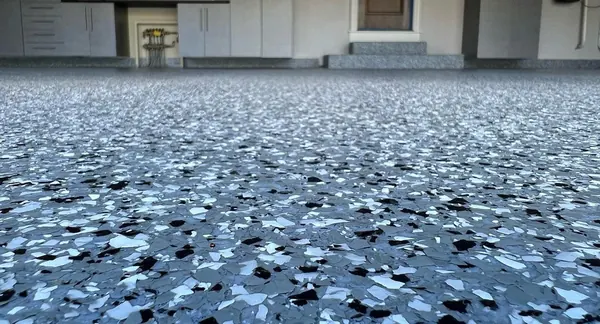 Blue, gray and white flake epoxy garage floor with a coated step, Draper, Utah