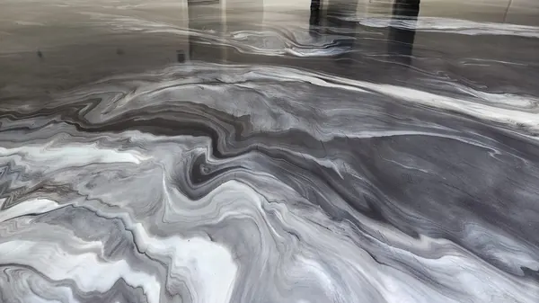 Gray and white marbled metallic epoxy floor in a new home, South Jordan, Utah