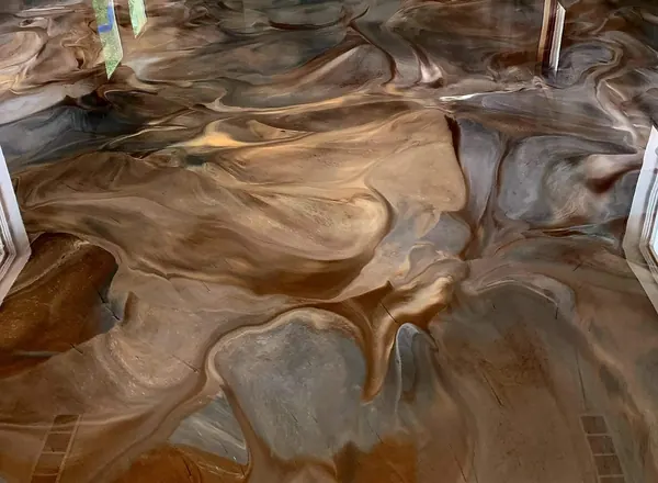 Copper and brown metallic epoxy floor in a home